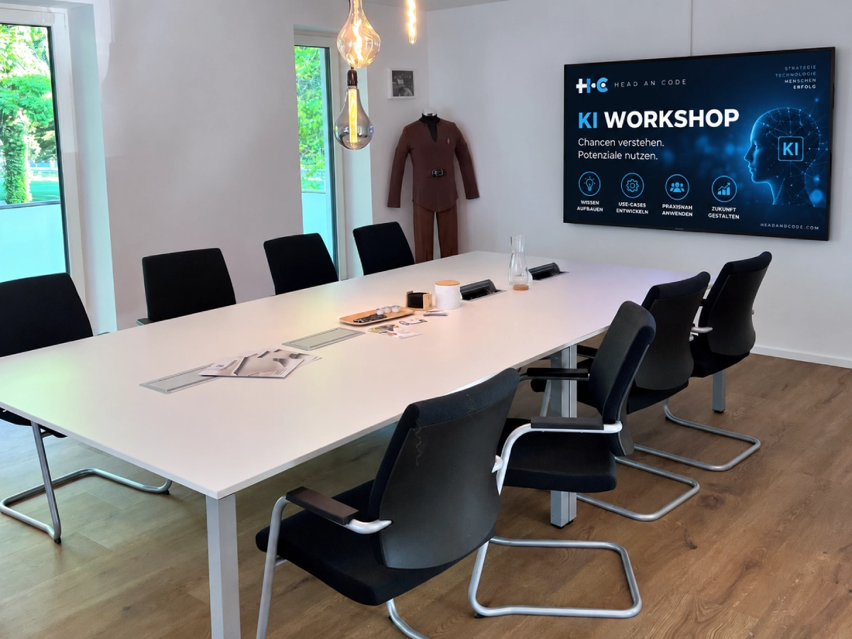KI-Workshop von Head & Code – Mitarbeiter arbeiten praktisch mit KI-Systemen